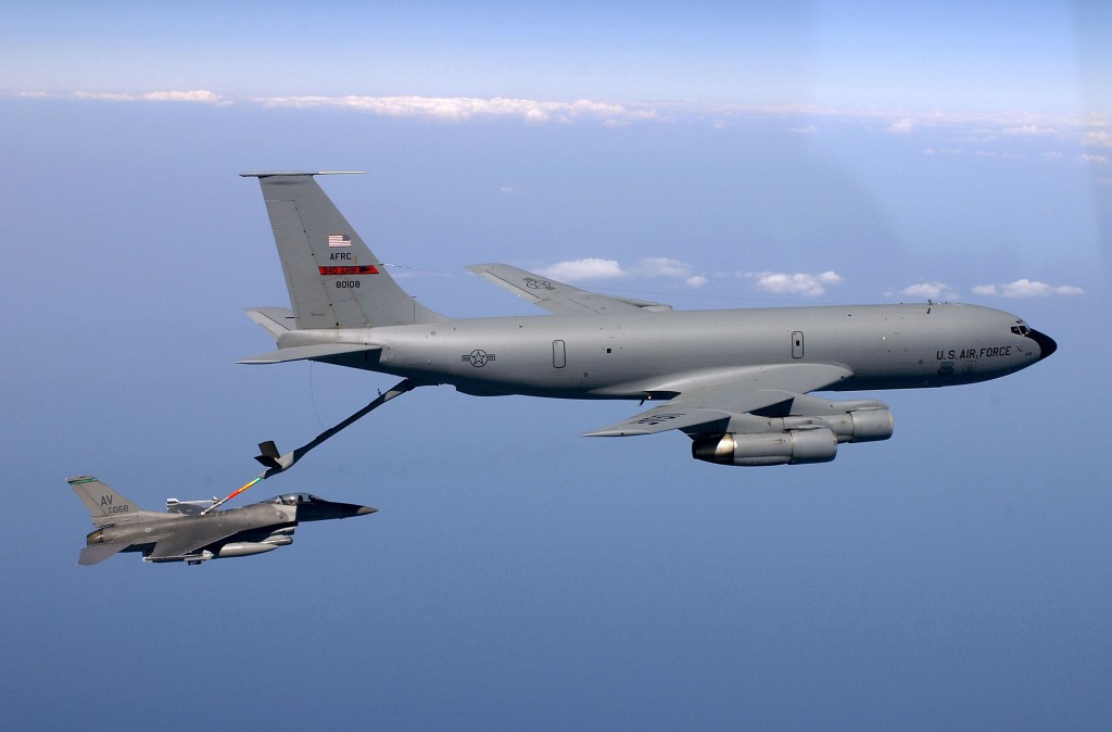 FILE PHOTO -- A KC-135 Stratotanker refuels an F-16 Fighting Falcon.  Air Force Secretary Dr. James G. Roche concluded testimony before the Senate Armed Services Committee on Sept. 4.  He answered questions about the 2004 Air Force Tanker Lease Proposal, which would replace ageing KC-135s leased KC-767s.  (U.S. Air Force photo by Tech. Sgt. Mike Buytas)